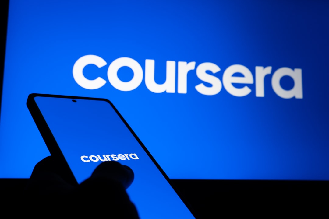 coursera-logo-displayed-on-phone-and-screen-6sg939tb3xq